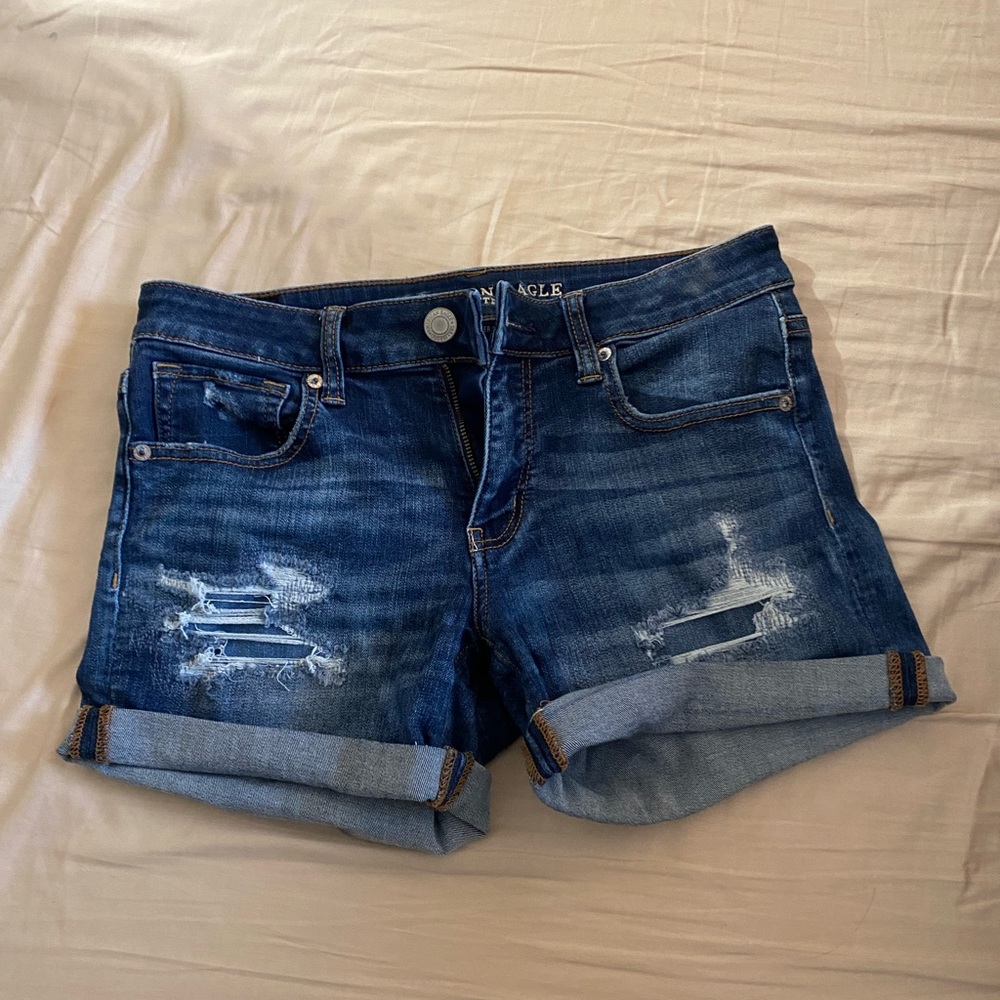 AE gently worn super stretch x midi shorts with cute distressing